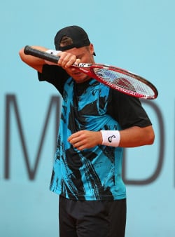 Ferrer päätti Hewittin kaksinpeliuran
