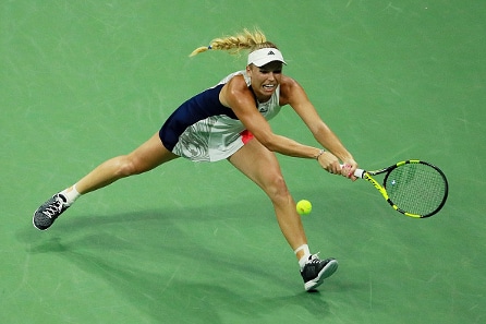 Caroline Wozniacki passitti vanhan mestarin katsomoon US Openissa