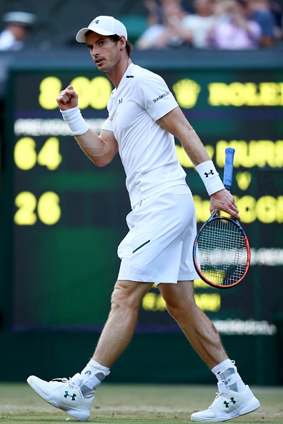 Andy Murray paineli parinsa kanssa nelinpelin toiselle kierrokselle