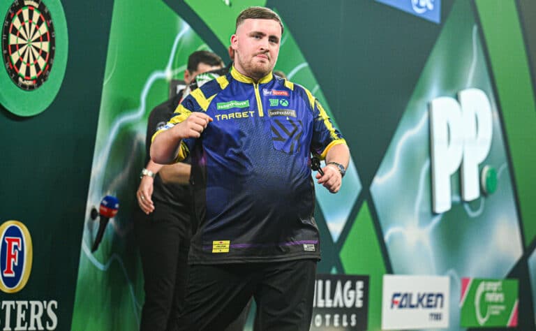 Dartsin MM-kilpailut on tarjonnut yllätyksiä - Nappaako hallitseva mestari jälleen voiton? Dartsin MM-kilpailut on tarjonnut yllätyksiä – Nappaako hallitseva mestari jälleen voiton?