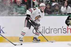 NHL-seura Chicago Blackhawks jysäytti pöytään 21 miljoonan dollarin sopimuksen Oliver Moore, Chicago Blackhawks